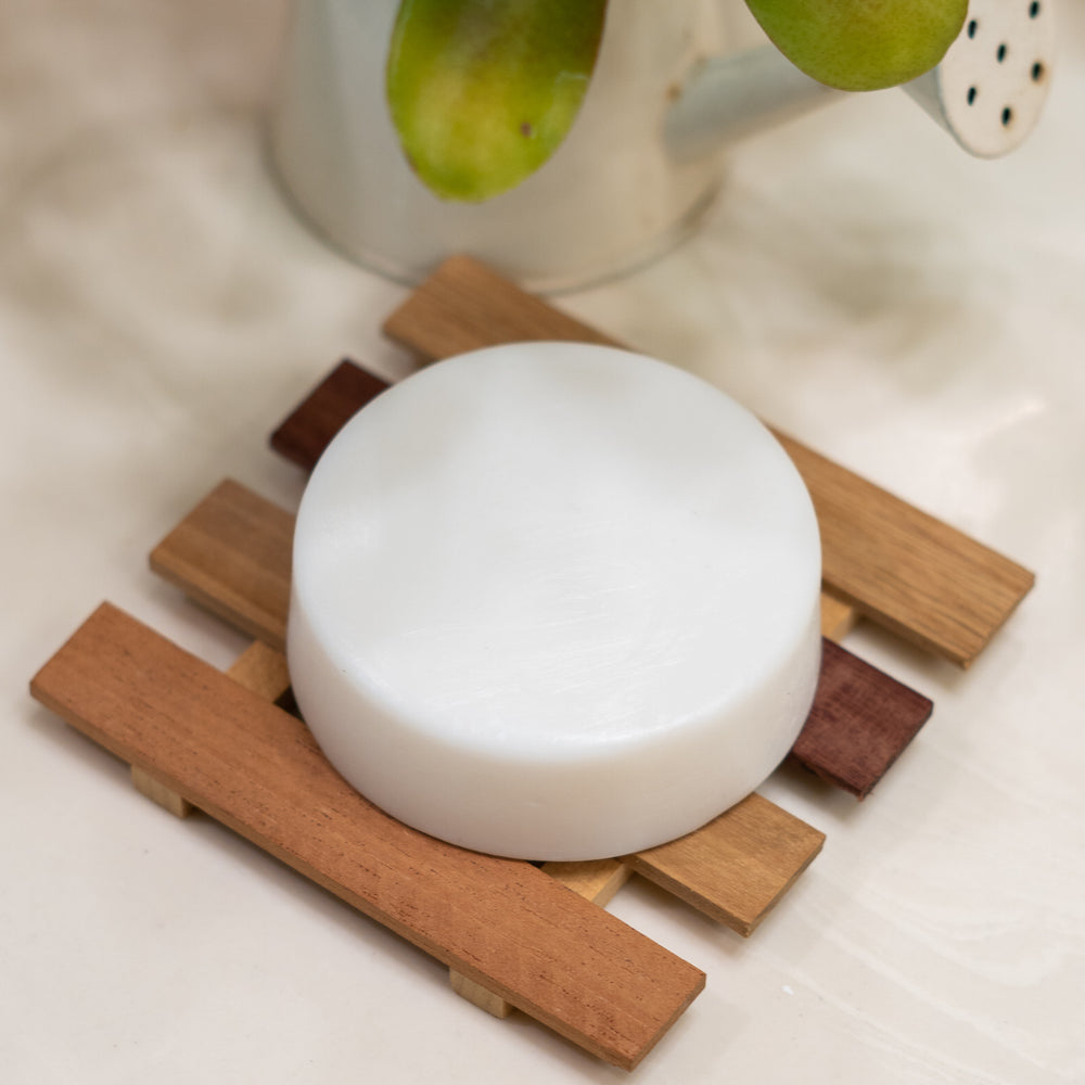 Soap on a wooden soap dish - Kisses of Coconut