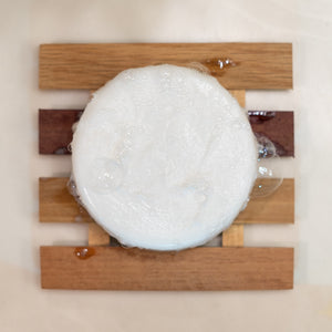 Soap on a wooden soap dish - Kisses of Coconut