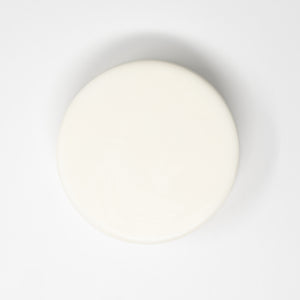 White circular bar of soap